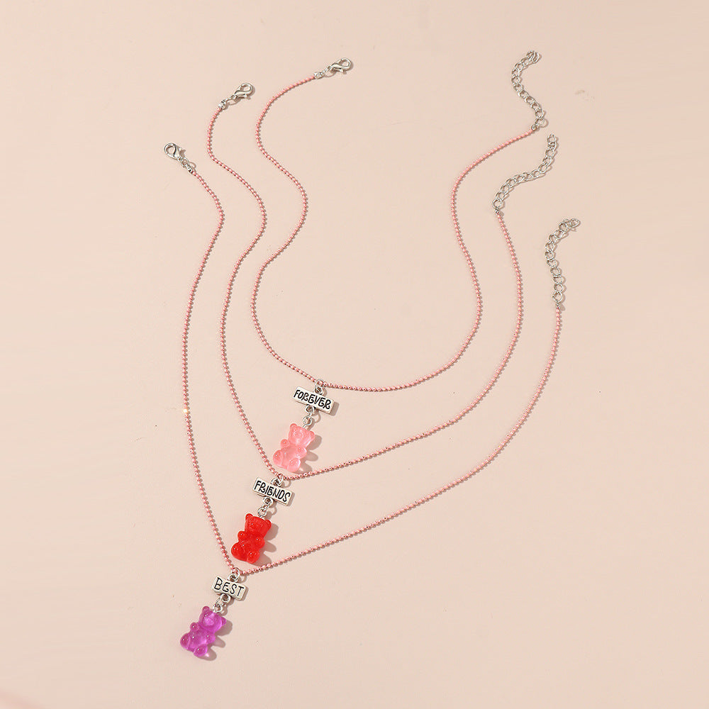 Set di collana in resina a forma di orsetto in stile fumetto per bambini con catena di perline rosa e lunghezza regolabile