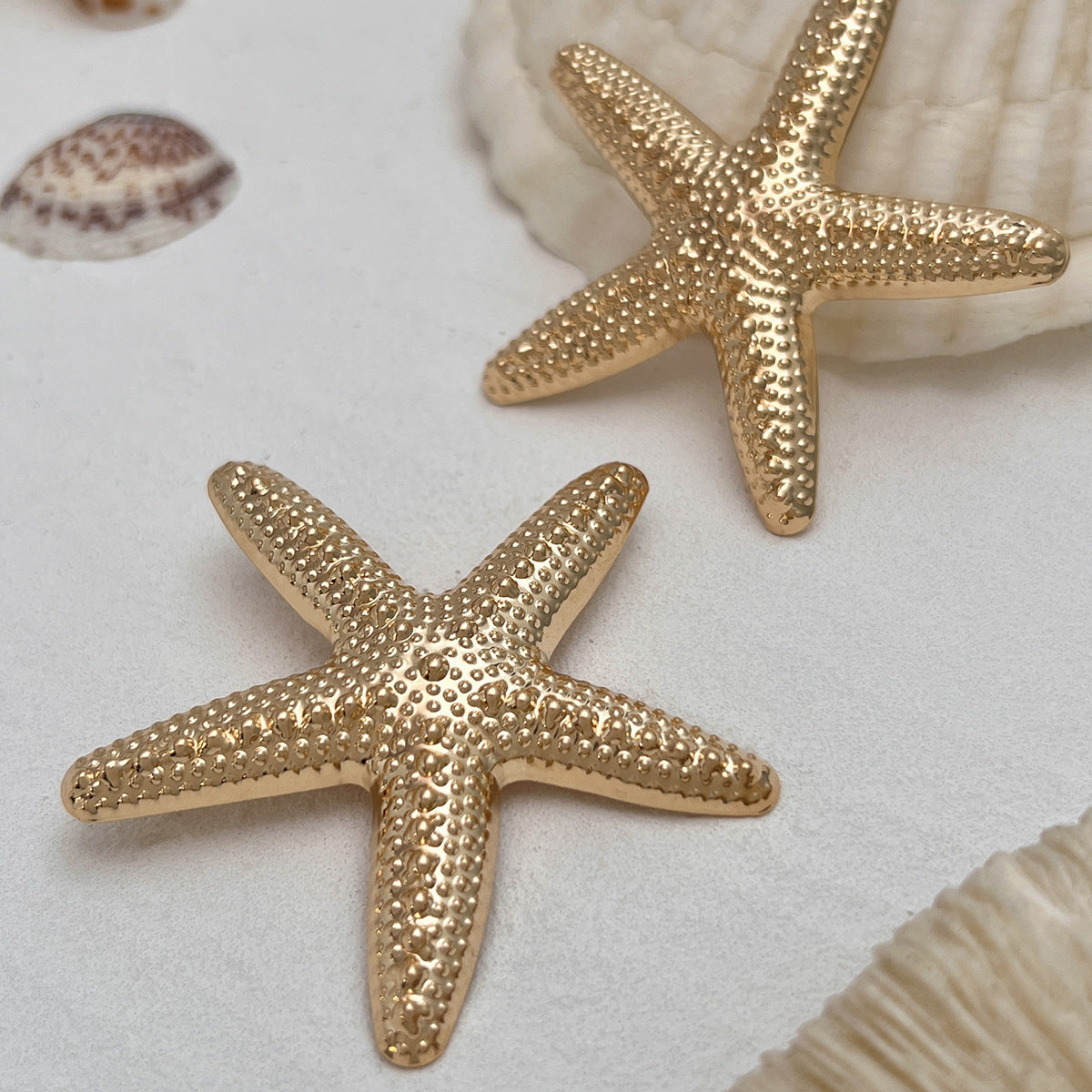 Vacation Style Star-Shaped Geometric Metal Stud Earrings for Women with Electroplated Finish and Beach-Inspired Design