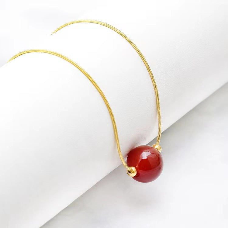 Geometric Titanium Steel Snake Chain Necklace with Gold-Plated Lucky Bean Pendant and Genuine Agate Beads