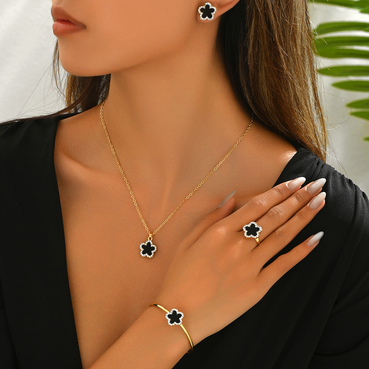 Elegant Plum Blossom Design Alloy Necklace Bracelet Earrings and Ring Set with Rhinestone Inlay for Women