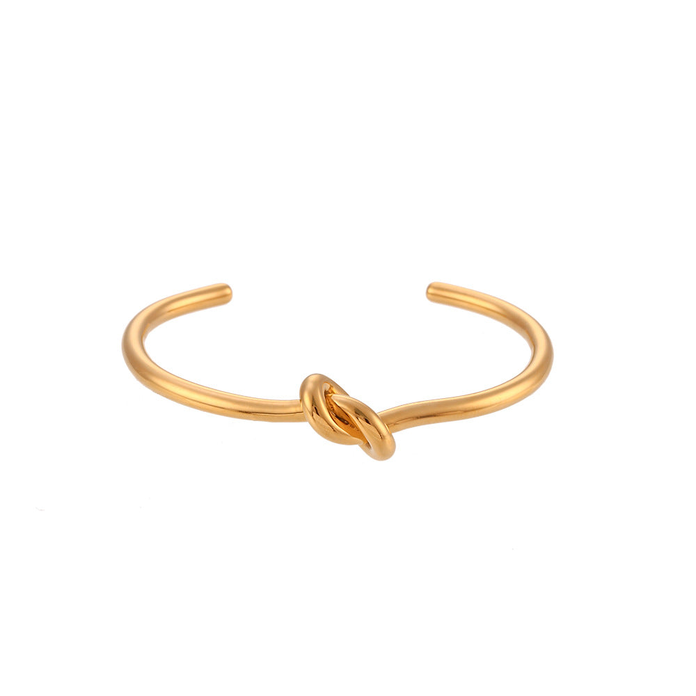 Bracciale da donna placcato oro 18 carati in acciaio inossidabile dal design minimalista a nodo