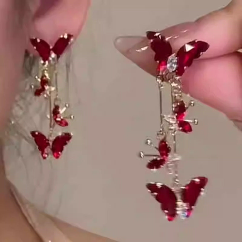 Orecchini pendenti eleganti a farfalla da donna in rame placcato con zirconi