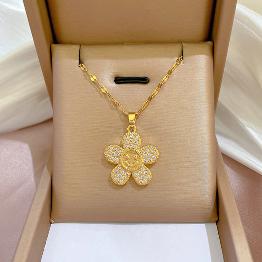 Collar con colgante geométrico de sonrisa floral exótica para mujer en acero titanio con detalles microengastados y estilo de cadena a la clavícula