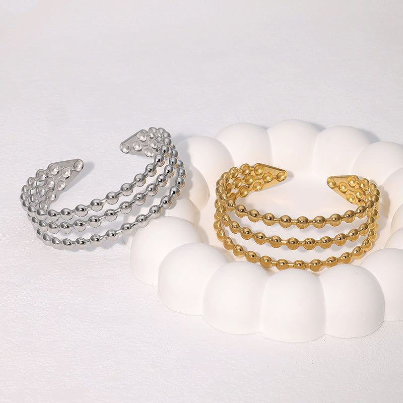 Bracciale da donna in acciaio inossidabile a linea geometrica minimalista con finitura placcata