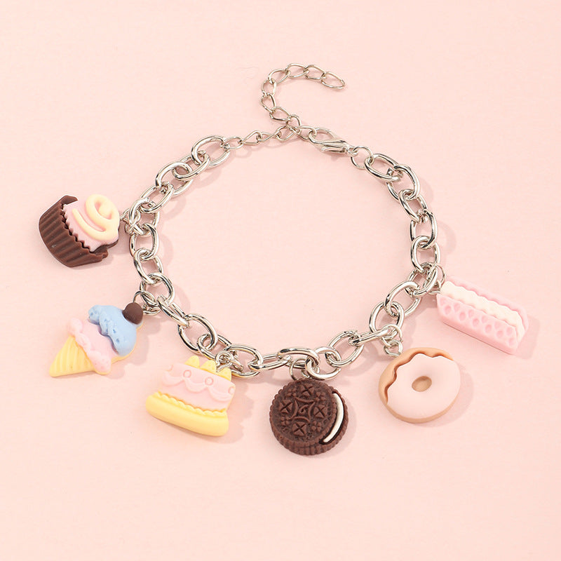 Pulsera de resina con colgante geométrico estilo punk para niñas, con cadena gruesa y borla.