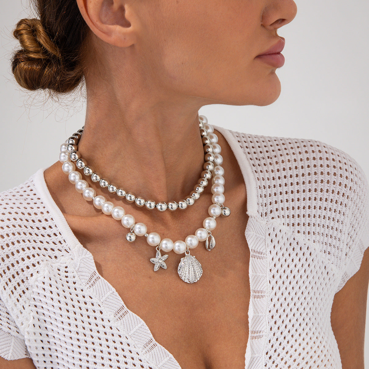 Collana da donna con ciondolo a stella in lega stile vacanza minimalista, finitura galvanizzata e perline in madreperla