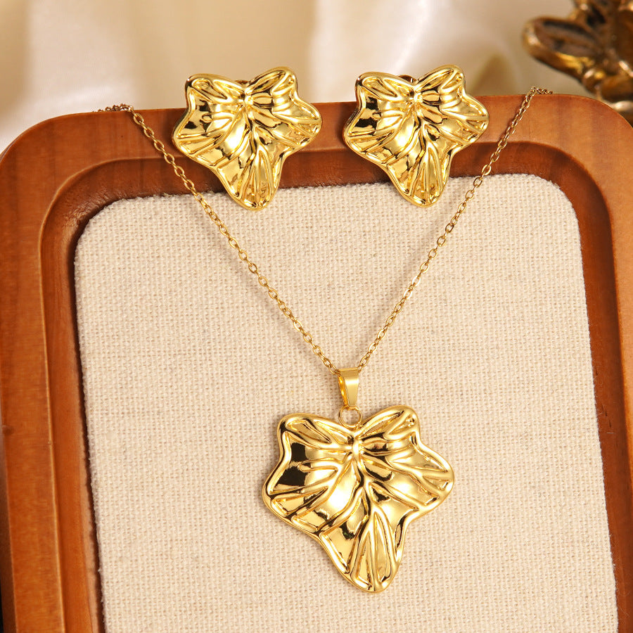 Set collana e orecchini a stella marina con fiocco conchiglia smaltato in acciaio inossidabile e titanio con catena a cavo per donna