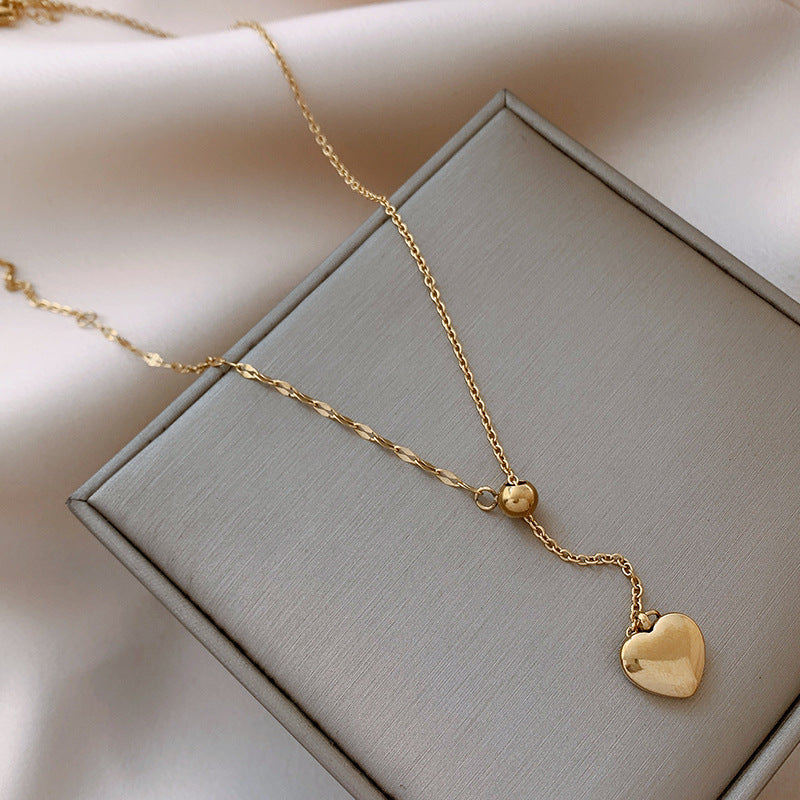 Minimalist Elegant Gold-Tone Titanium Steel Heart Pendant Necklace for Women Adjustable Clavicle Chain