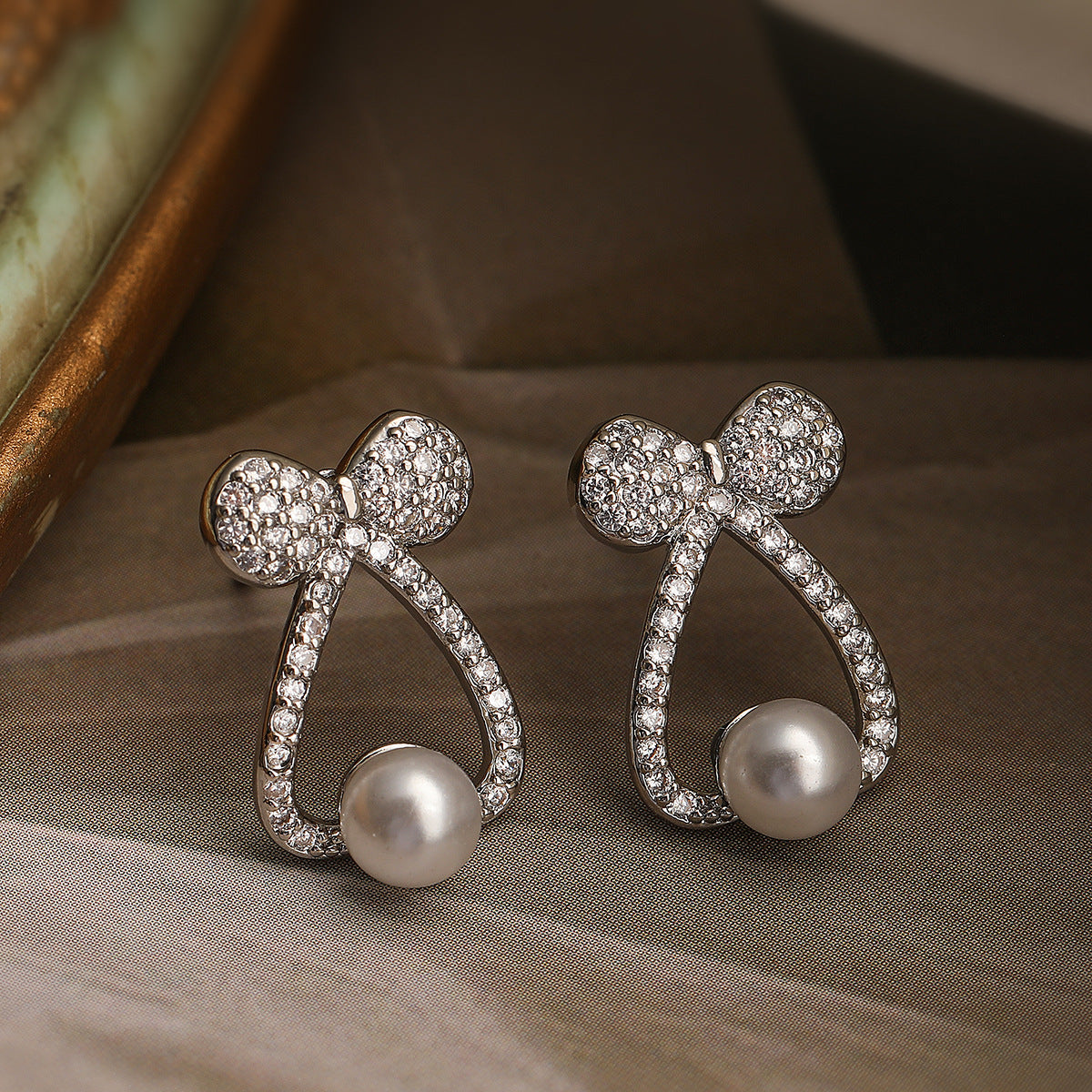 Geometric Bowknot Butterfly Earrings for Women with Copper Base Plated in Real Gold Micro-Paved Zirconia and Pearl Accents