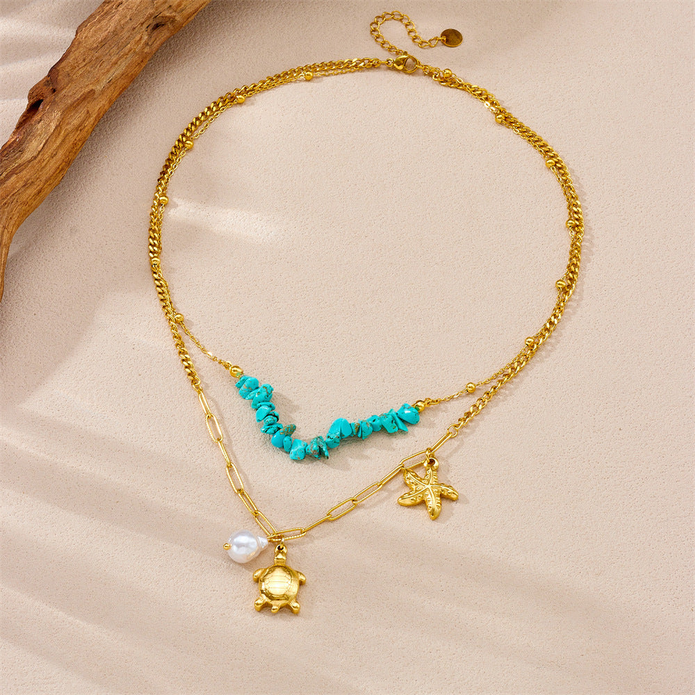 Collana con ciondolo personalizzato a forma di tartaruga e stella marina in acciaio inossidabile con strass blu su catena a maglie per donna
