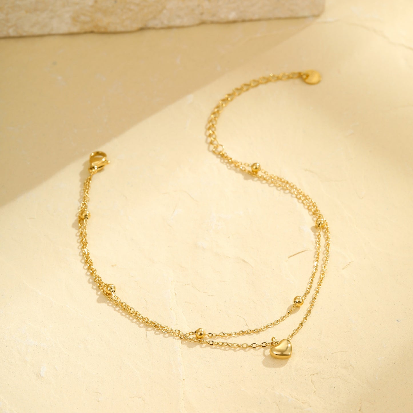 Cavigliera minimalista multistrato in acciaio inossidabile a forma di cuore da donna con design geometrico stile vacanza estiva al mare