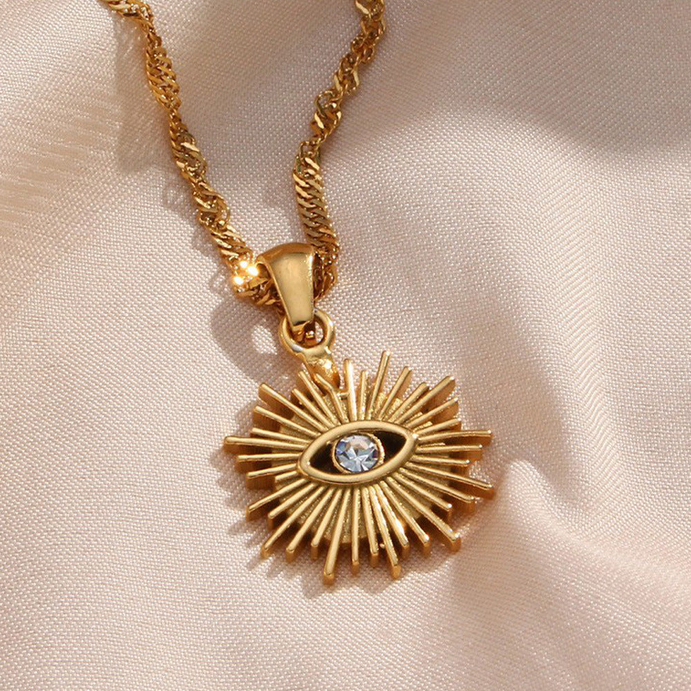 Collar con Colgante de Ojo Turco de Moda en Acero Inoxidable con Incrustaciones de Pedrería Radiante Hueca y Cadena Ondulada para Mujer