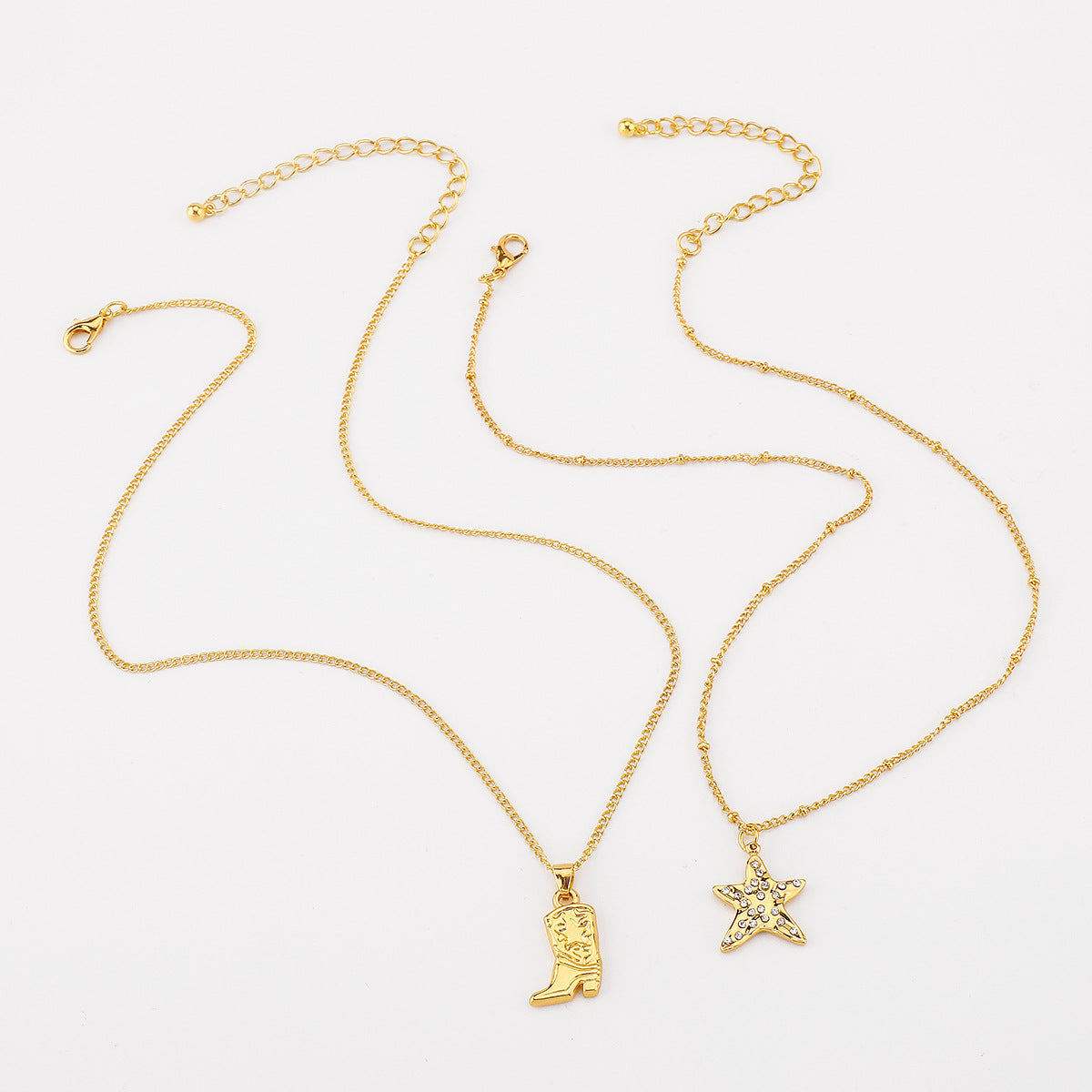 Collana alla moda con pendente a forma di stella, intarsi in strass e catena in ferro elettrodeposto, da donna