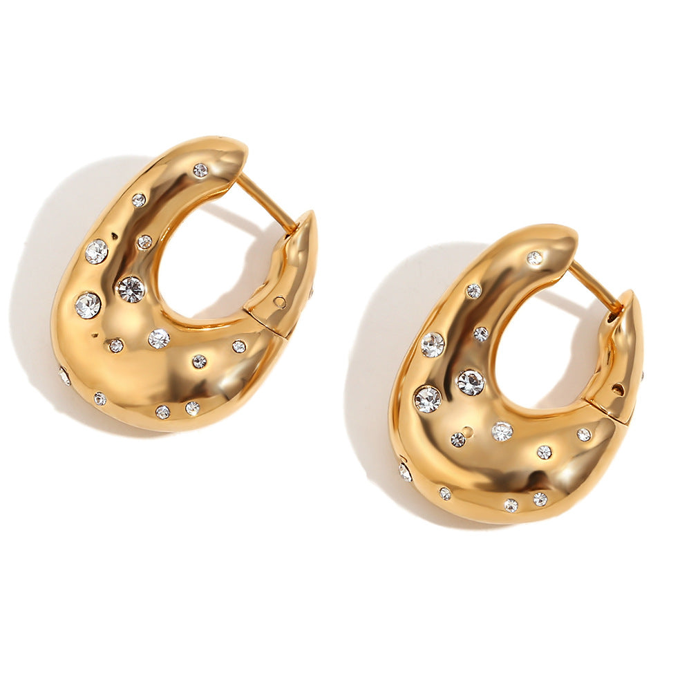 Orecchini a perno geometrici alla moda in acciaio inossidabile con placcatura in oro 18K e design a stella irregolare attorcigliata da donna