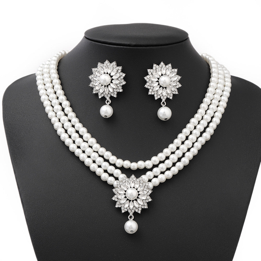 Minimalist Snowflake Pearl Necklace Set with Rhinestone Pendant, Plated Pearl Bracelet and Earrings for Women