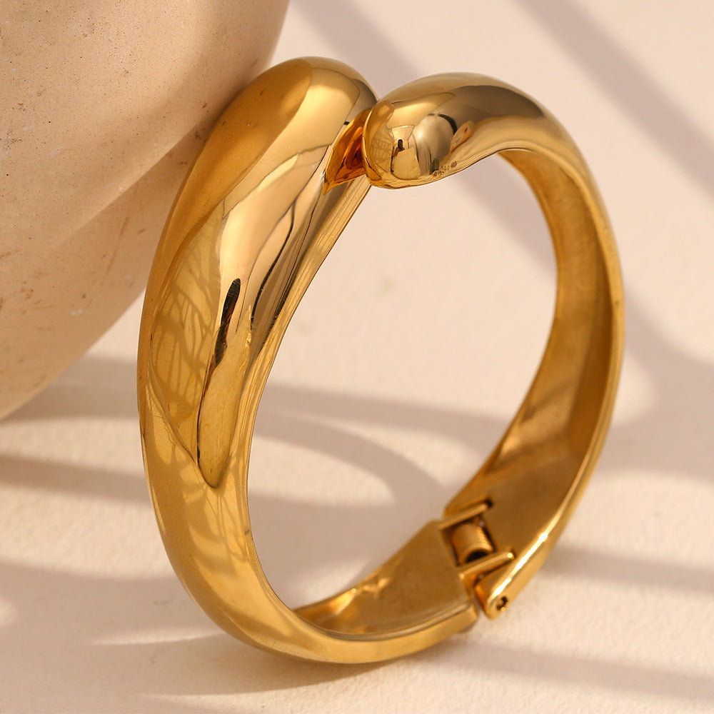 Pulsera minimalista extragrande de acero inoxidable con baño de oro de 18K y diseño de doble cabeza de serpiente para mujer
