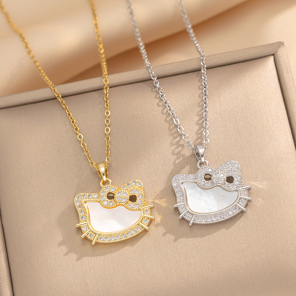 Collana minimalista con pendente a fiocco di gatto da donna in acciaio al titanio con intarsio di strass su catena a serpente