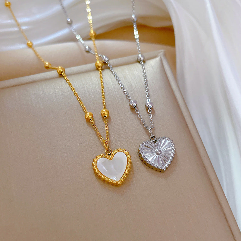 Cadena de cuello con colgante de corazón minimalista de acero de titanio con incrustaciones de nácar para un look chic de oficina unisex