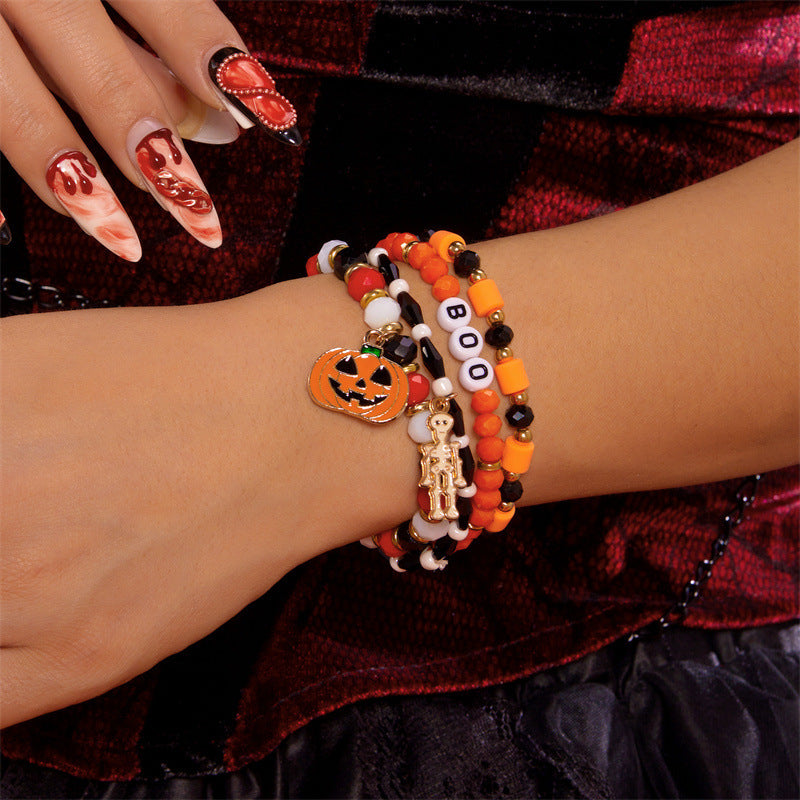 Bracciale da donna con perline a forma di teschio, zucca e fantasma in stile cartone animato, con ciondolo in lega e tema festa di Halloween