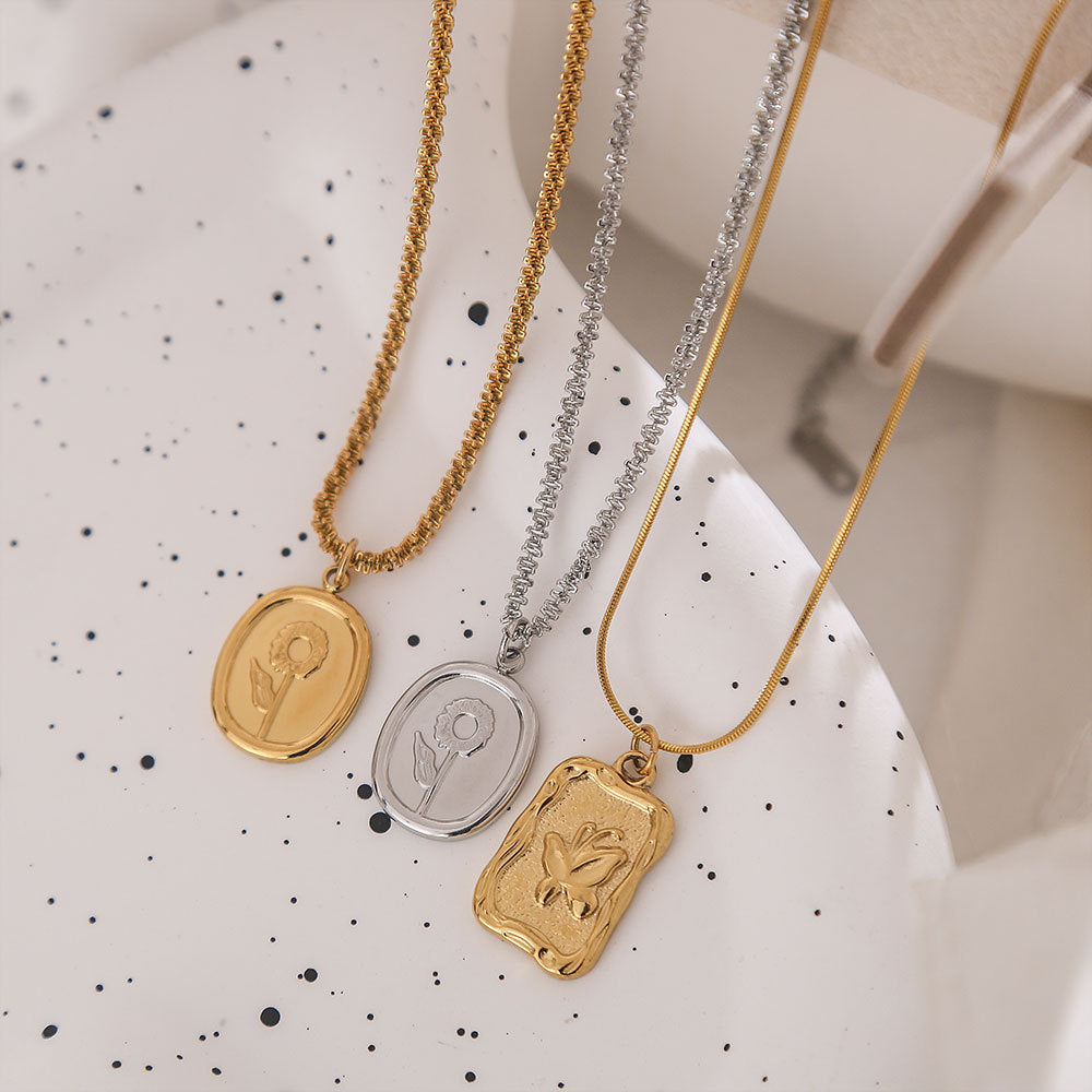 Collana con pendente a forma di girasole in stile vintage francese, in acciaio al titanio con finitura placcata, catena ondulata, elegante gioiello a strati per donna