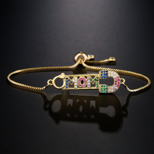 Pulsera geométrica minimalista de cobre con baño de oro y circonitas de colores para mujer