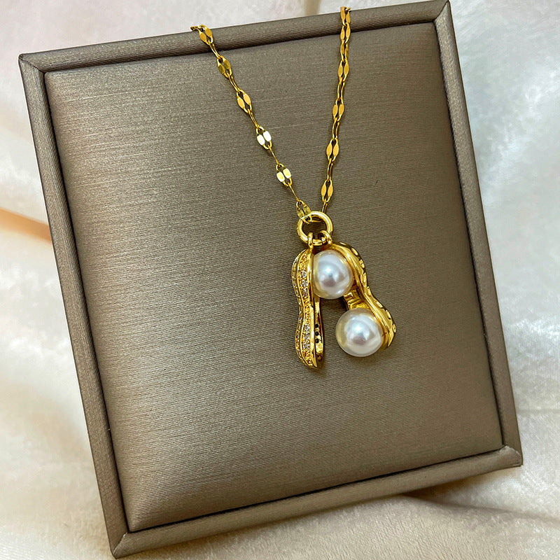 Collana con ciondolo a goccia in rame placcato oro 18 carati con micro-pavé e catena a onda in acciaio al titanio, design originale