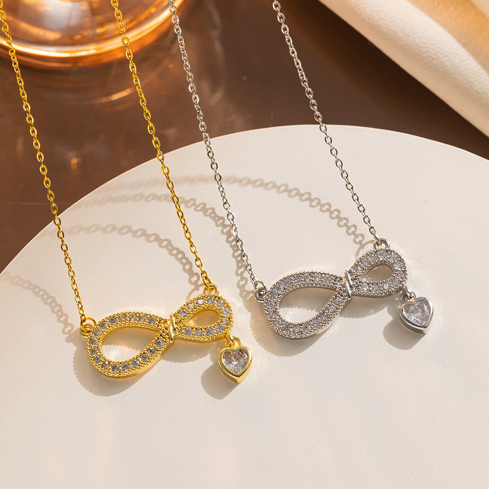 Collar de titanio minimalista con diseño de corazón en forma de ocho, microincrustaciones de circonia y colgante de cristal para mujer