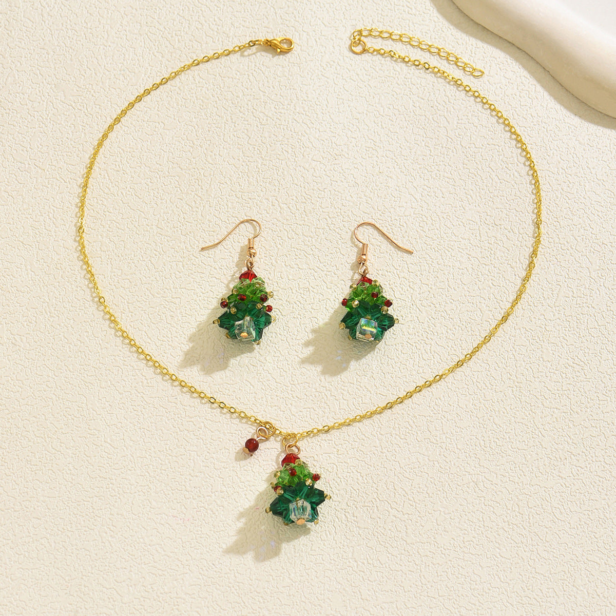 Set collana e orecchini a pendente con albero di Natale geometrico da donna in lega di zinco con intarsi in cristallo, gioielli alla moda per tutti i giorni