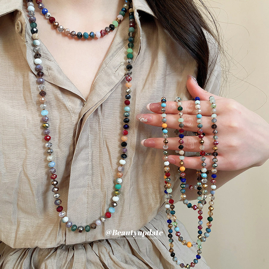 Collana da donna bohémien etnica geometrica con perline e dettagli in cristallo