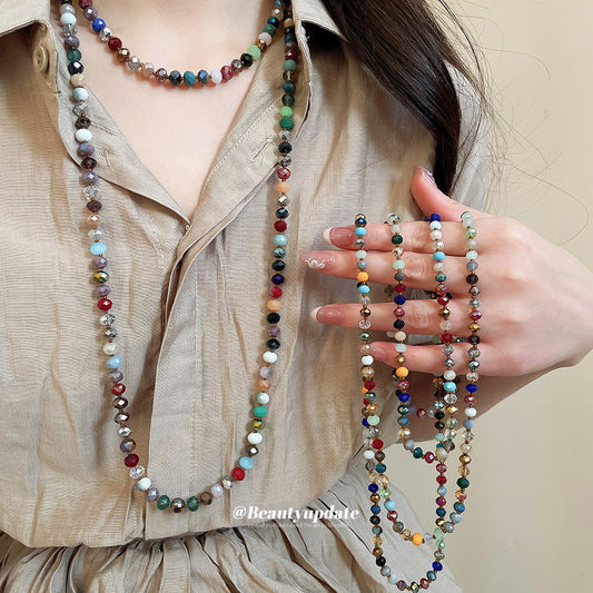 Collana da donna bohémien etnica geometrica con perline e dettagli in cristallo