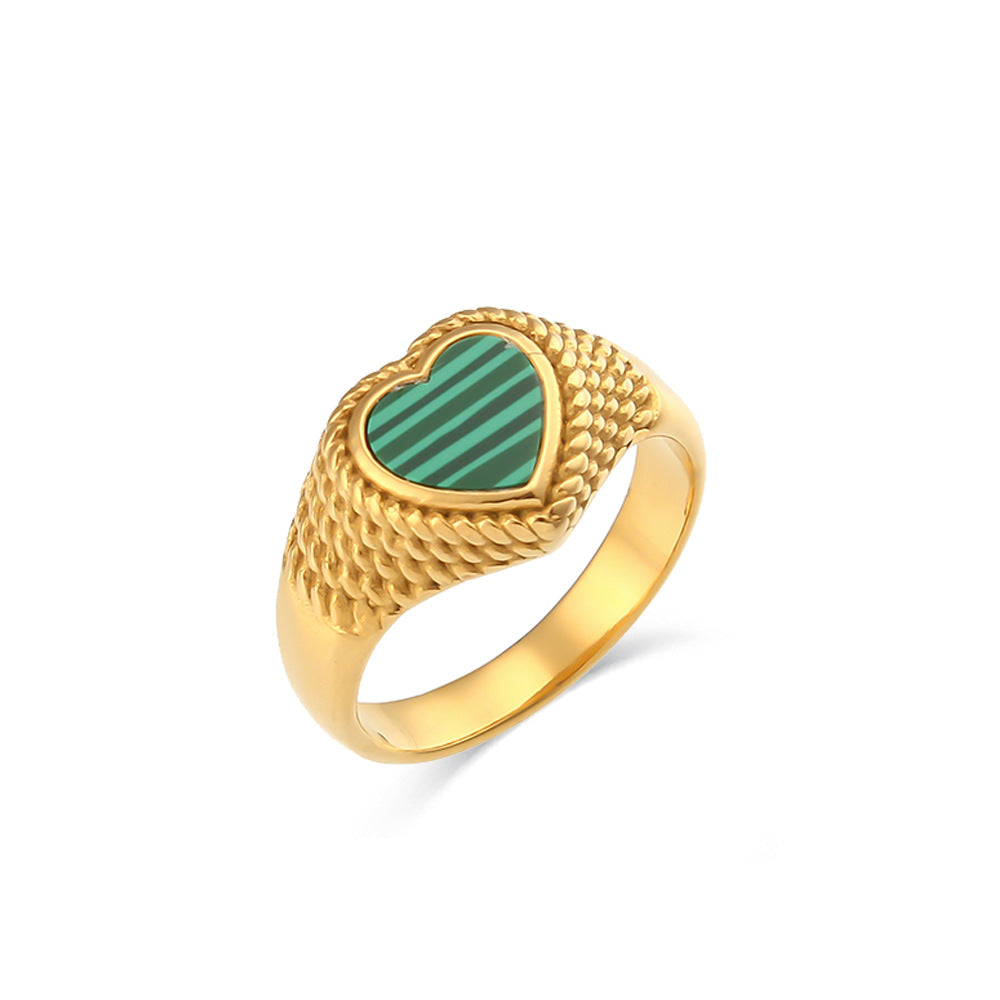 Anillo de acero inoxidable con forma de corazón estilo lujo, baño de oro de 18K y diseño trenzado.
