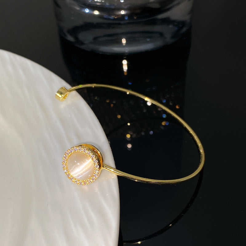 Minimalist Luxury Round Micro-Paved Cubic Zirconia Rotating Cat's Eye Moonstone Titanium Steel Necklace for Women