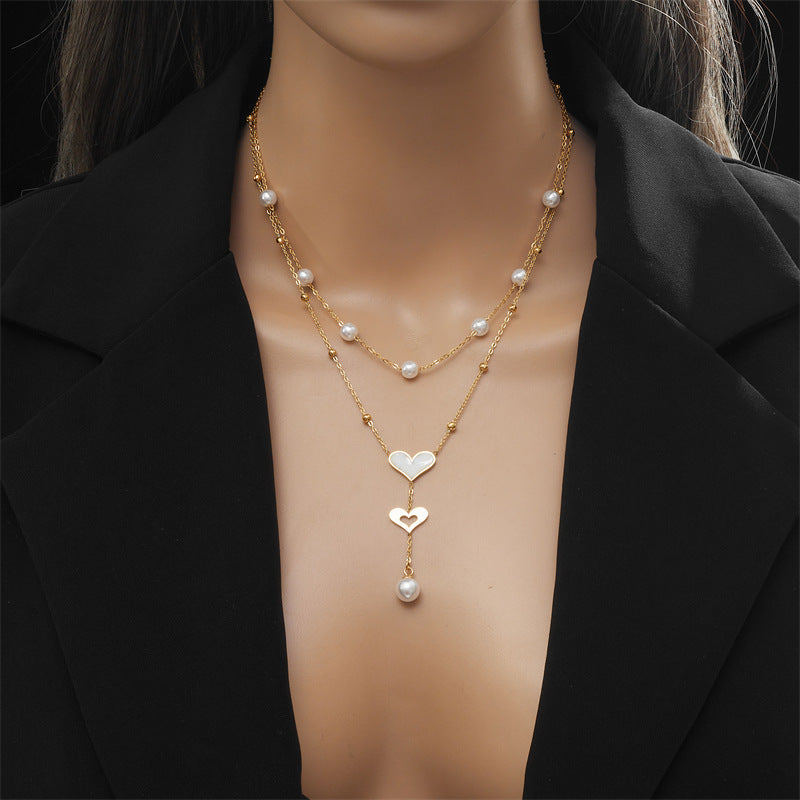 Vintage-Style Double-Layer Pendant Necklace with Pearl and Butterfly Charm, Stainless Steel Chain with Tassel Accents and Plated Finish