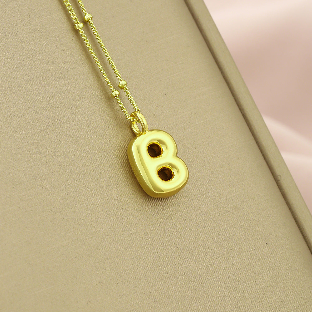 Collar Colgante con Inicial Minimalista para Mujer en Cobre con Acabado Galvanizado Cadena Ajustable para Clavícula