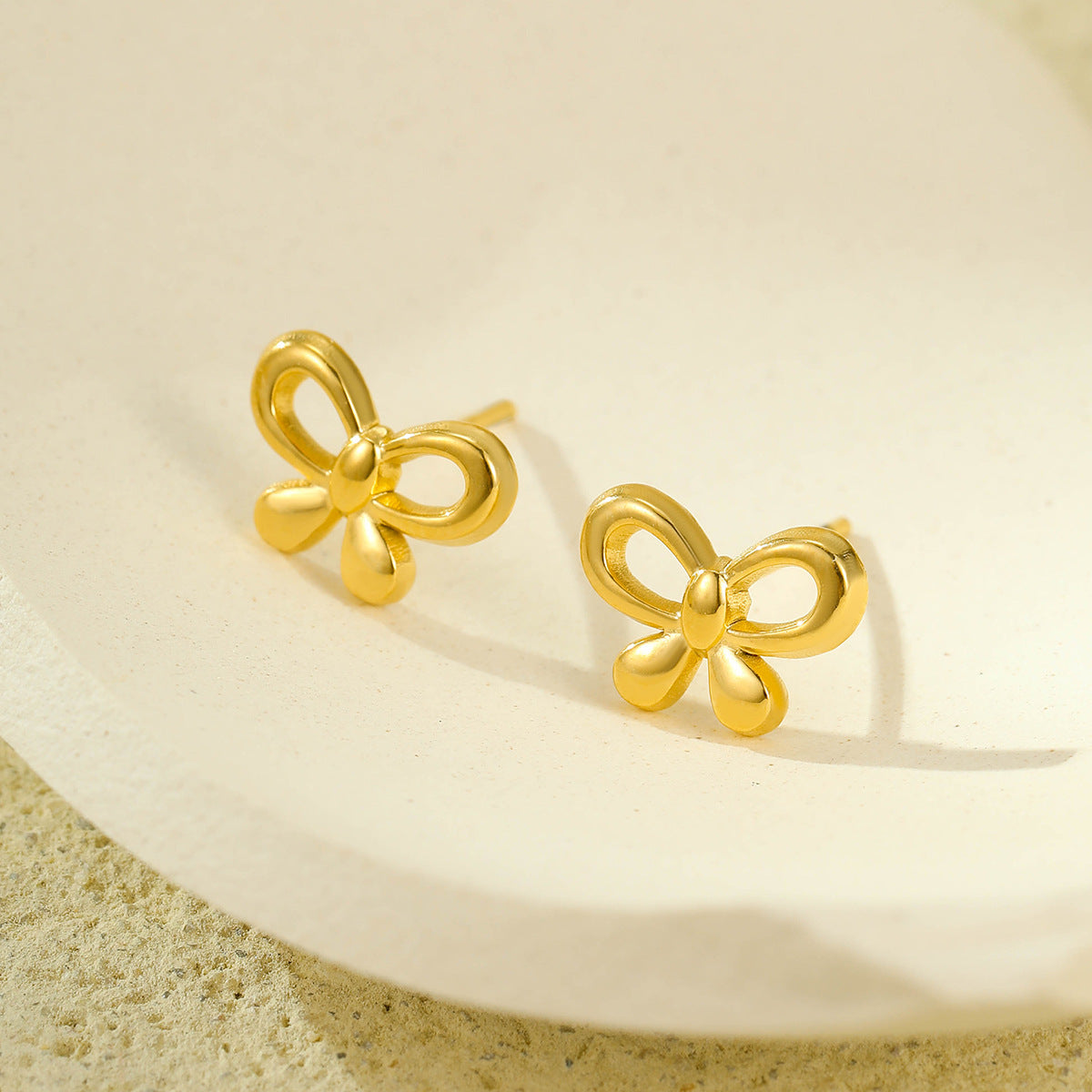 Set di orecchini a lobo minimalisti in acciaio inossidabile con fiocco e stella, con intarsio in strass, da donna