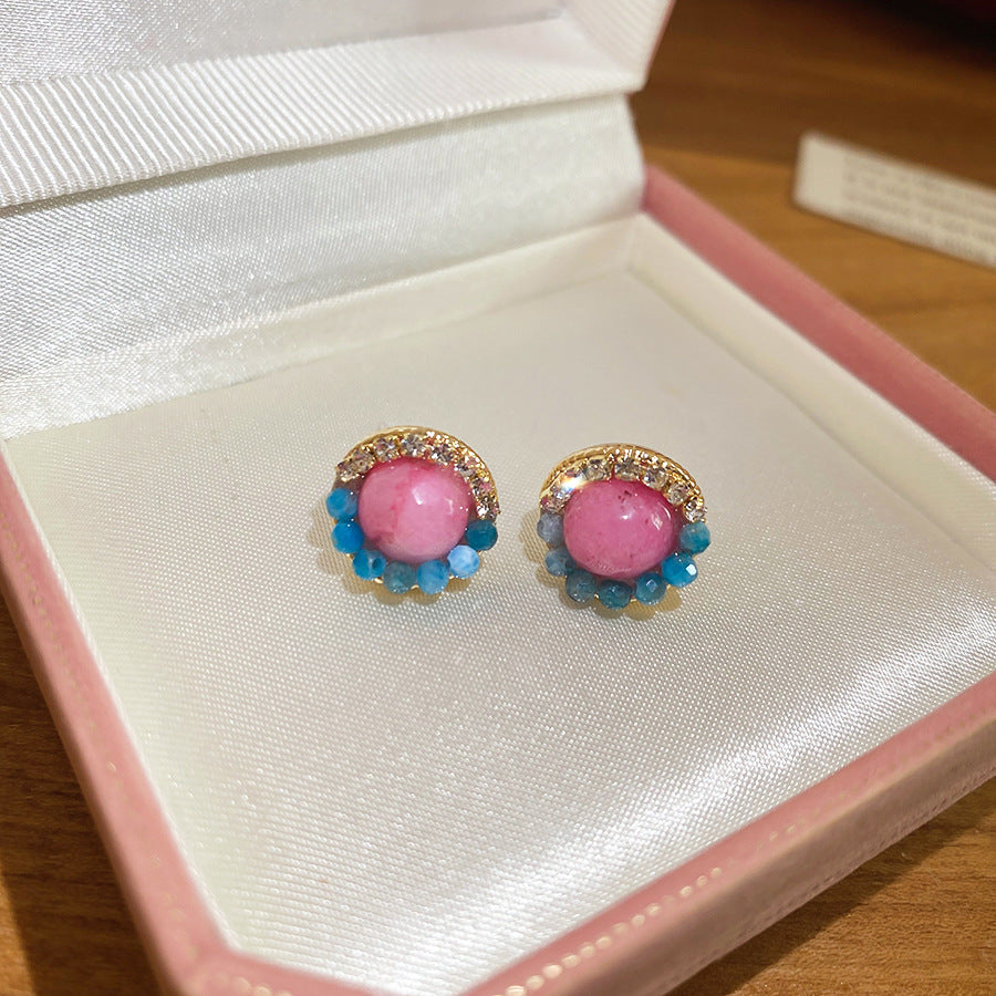 Elegantes aretes de flor con cristales y postes de acero enchapado para mujer