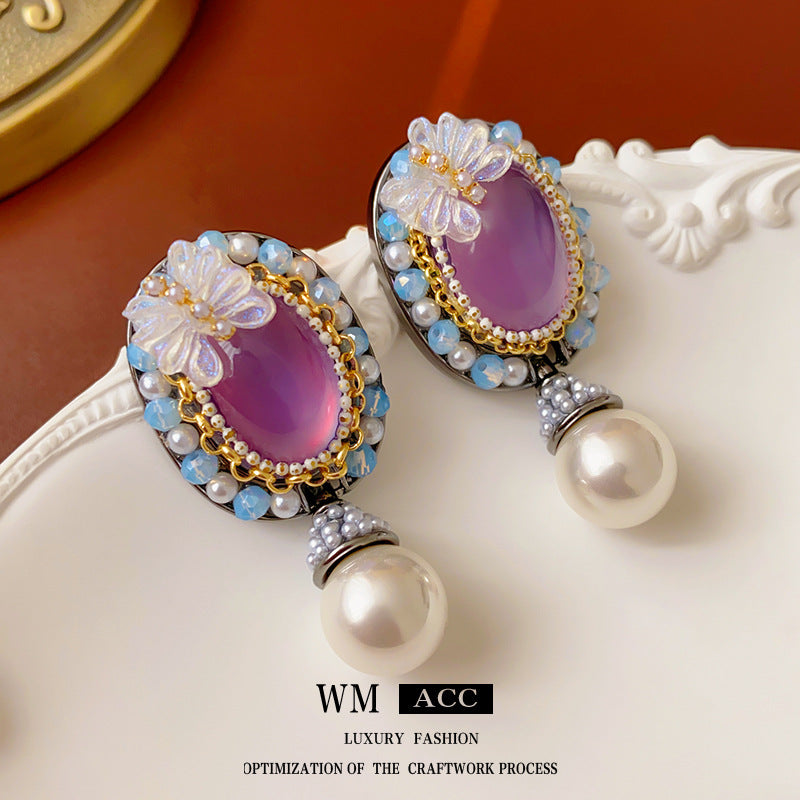 Orecchini a farfalla vintage in resina con cristalli e perle su base in lega placcata argento da donna