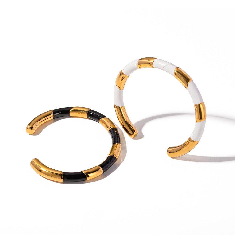 Braccialetto Minimalista Geometrico in Acciaio al Titanio con Finitura Smaltata Nera e Oro da Donna