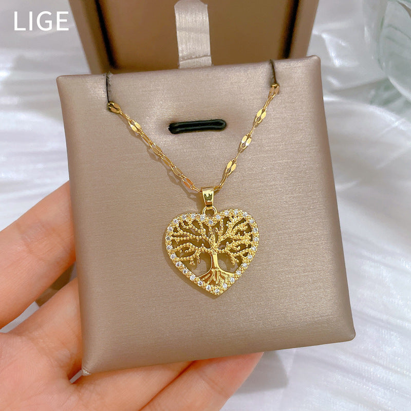 Collar de cadena de lujo de acero de titanio con forma de corazón y árbol de la vida con diamantes de imitación