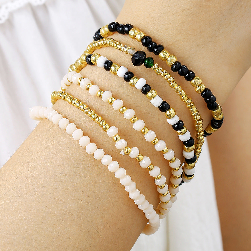 Bracciale elastico impilabile in stile bohémien per vacanze da donna con perline in vetro e design geometrico