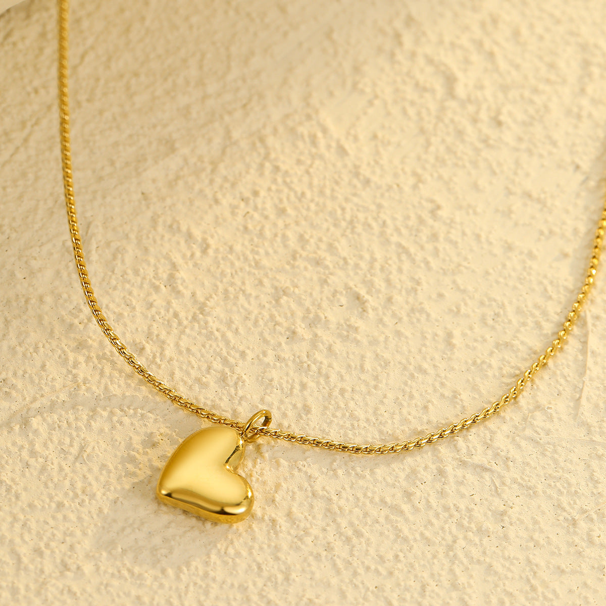 Collana per coppia alla moda a forma di cuore elettroplaccata in oro 18 carati in acciaio inossidabile