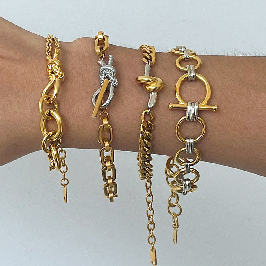 Bracciale in acciaio al titanio con nodo geometrico minimalista e finitura placcata da donna