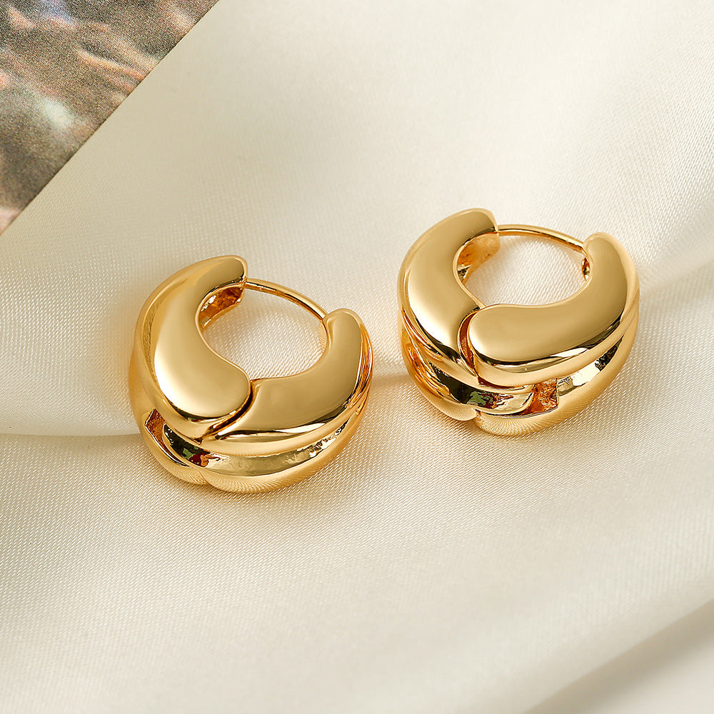Orecchini a cerchio da donna in rame con placcatura in oro, design geometrico irregolare e minimalista