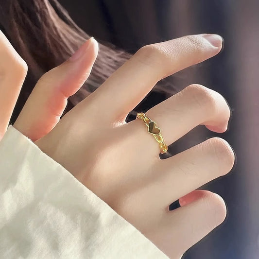 Anello da donna in acciaio al titanio placcato oro a forma di cuore geometrico scavato, dolce e minimalista