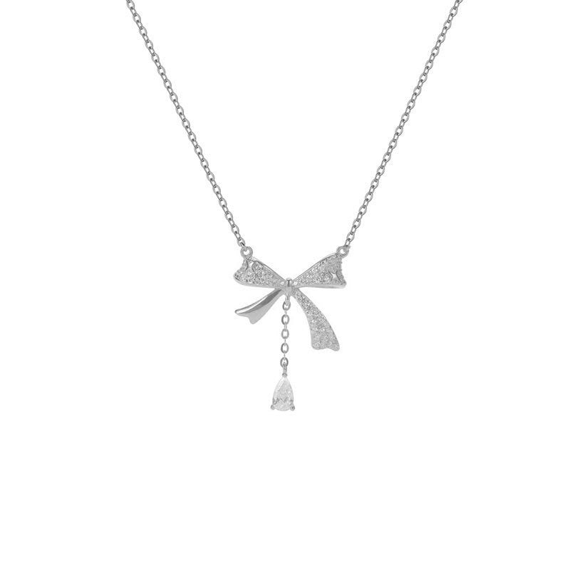 Minimalist Bow-Shaped Titanium Steel Pendant Necklace for Women with Plated Finish and Delicate Layered Look
