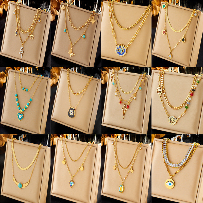 Collana da donna con ciondolo a farfalla e stella a strati in acciaio inossidabile alla moda