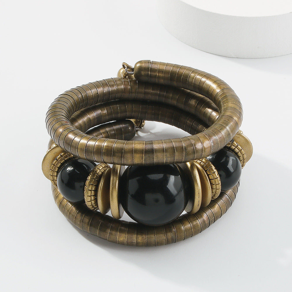 Pulsera Boho de Hueso de Serpiente Multicapa con Cuentas Turquesas Diseño Geométrico Joyería de Mano Unisex