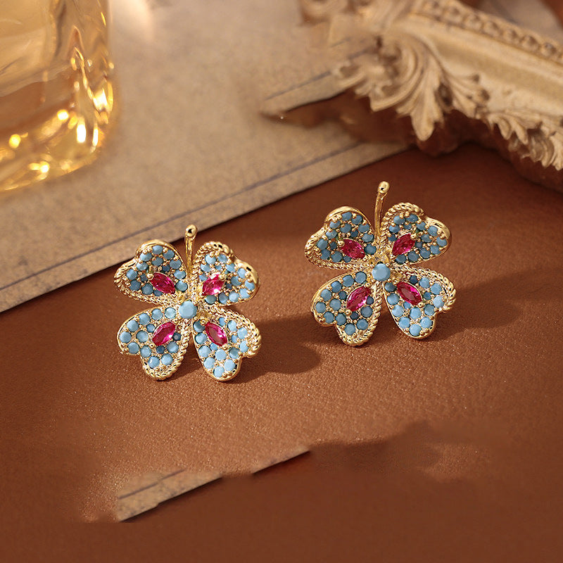 Orecchini a perno floreali in stile vintage con intarsio in strass su base in lega e perni in acciaio inossidabile da donna