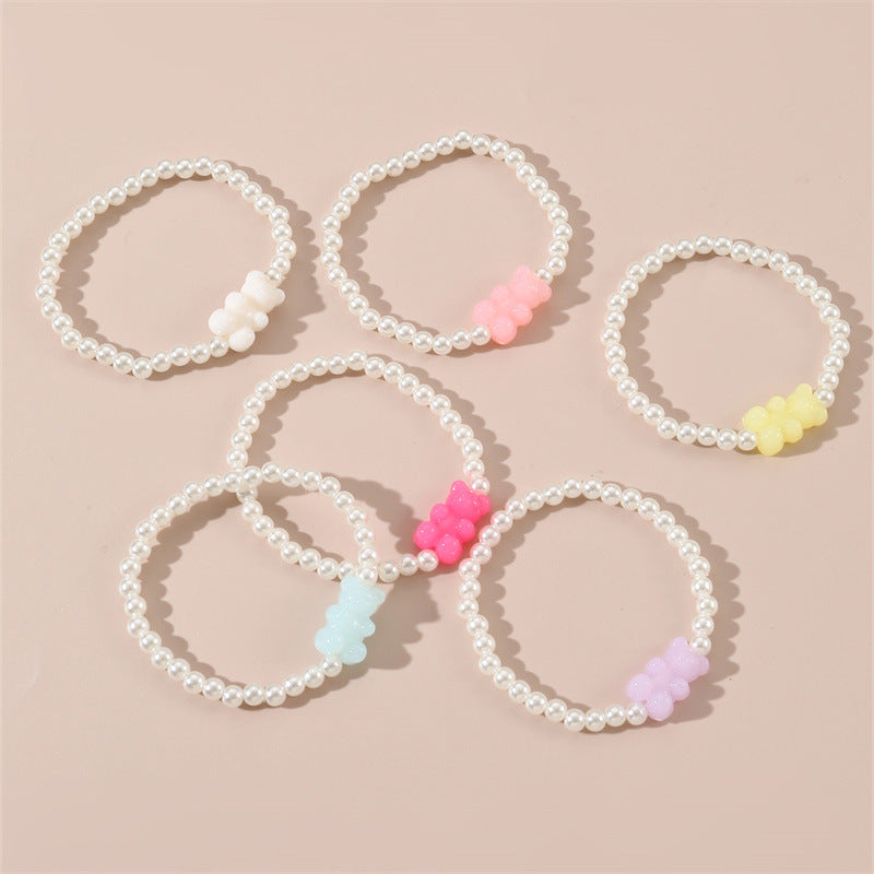 Braccialetto con ciondolo a orsetto minimalista e carino per bambini, fatto a mano in argilla polimerica, con perline e design a forma di cuore