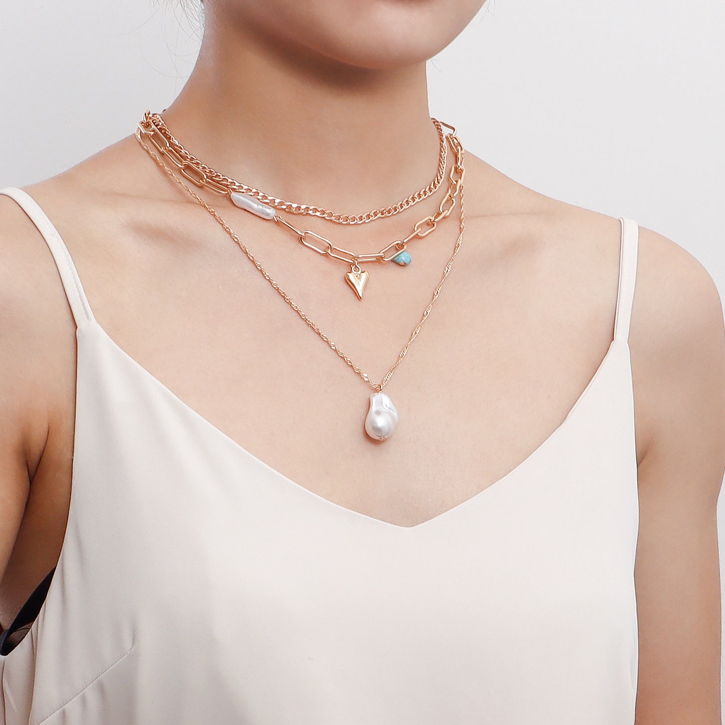 Trendy Multi-Layer Asymmetrical Pearl-Effect Heart Pendant Necklace for Women in Alloy with Plated Finish